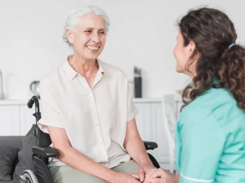 nurse-looking-female-senior-patient-wheel-chair Large